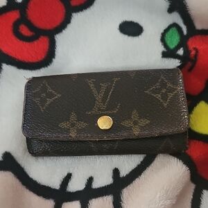 Louis Vuitton Monogram Canvas Trifold Wallet in Brown with Gold Snap